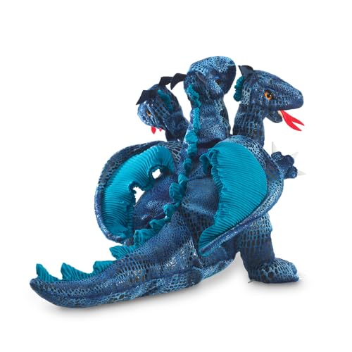 Folkmanis blue dragon hand puppet in hand for lively play.
