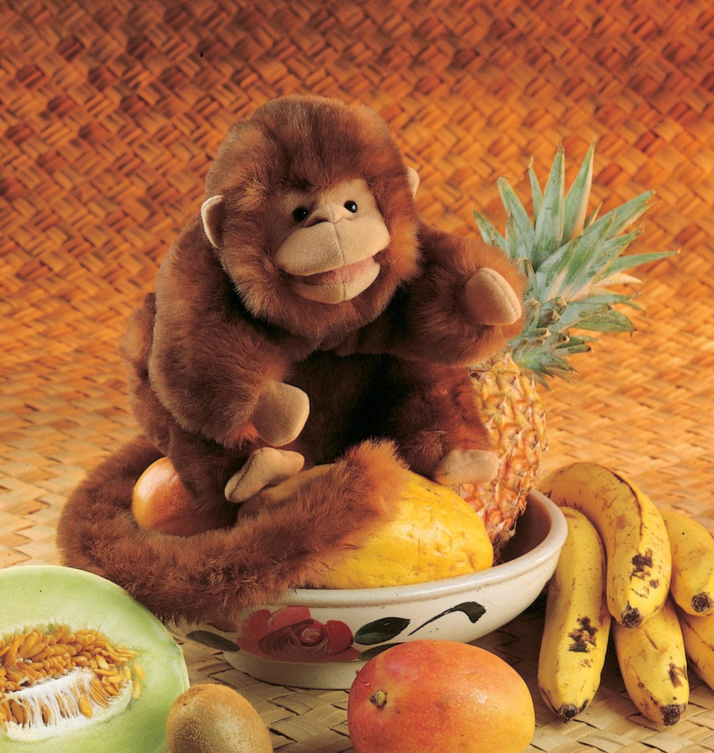 Folkmanis Monkey Hand Puppet on stage supports interactive theatre and classroom demonstrations.