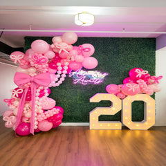 FQZYLCH birthday party decor inspiration with versatile pink balloon arch.