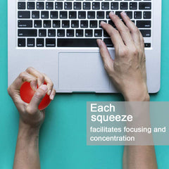 FreeNFond stress relief ball on a desk promotes focus and tension release.