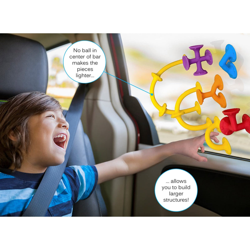 Froogz Froogly silicone suction pieces designed for building on tables or walls.