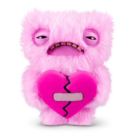 Fuggler Love Fugg pink face close-up showing quirky smile and collectible charm.