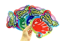 Fun a Ton blue giant snap hand demonstrates wall-sticking play and stress-relief for kids.
