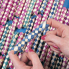 Finger traps on a party table inviting playful mischief