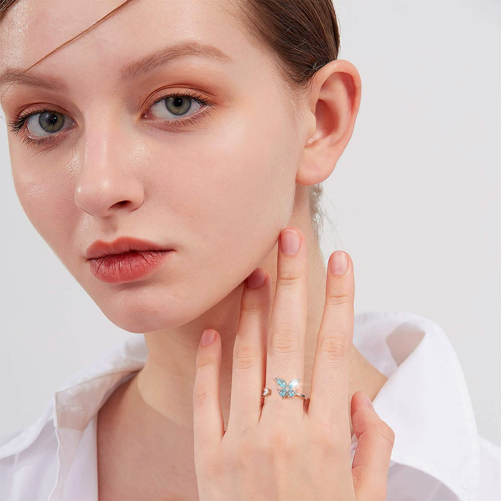 FUNEIA fidget ring closeup highlighting cubic zirconia and premium finish.