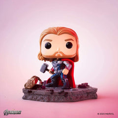 Funko Avengers Assemble Thor Deluxe figure with teammates for a dramatic display
