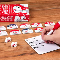 Funko Coca-Cola Polar Rollers players around the table for group fun.