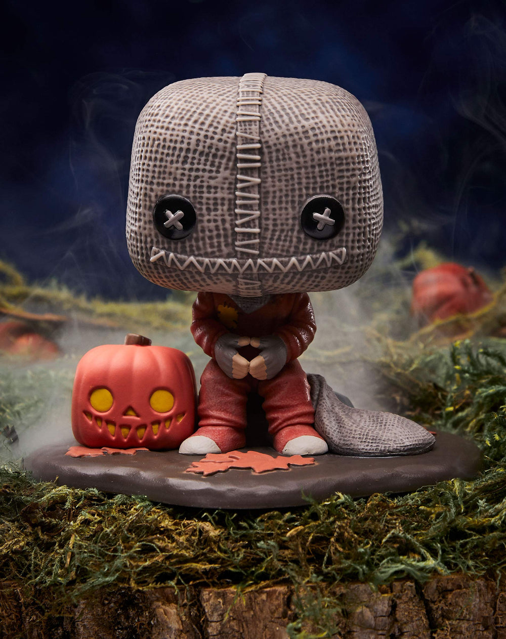 Funko Spirit Halloween Sam POP! Deluxe display stand included for easy posing.