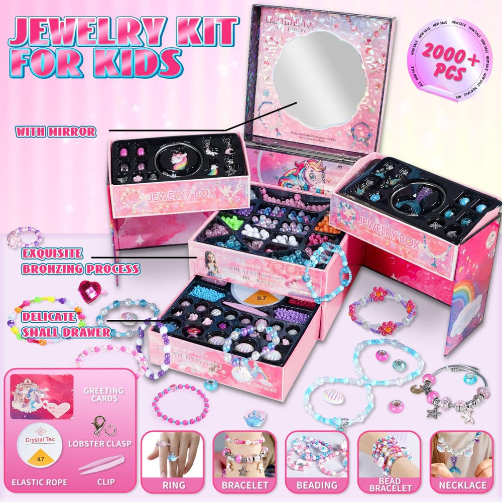 Open gift box reveals a mirror and four drawers of surprise treasures.