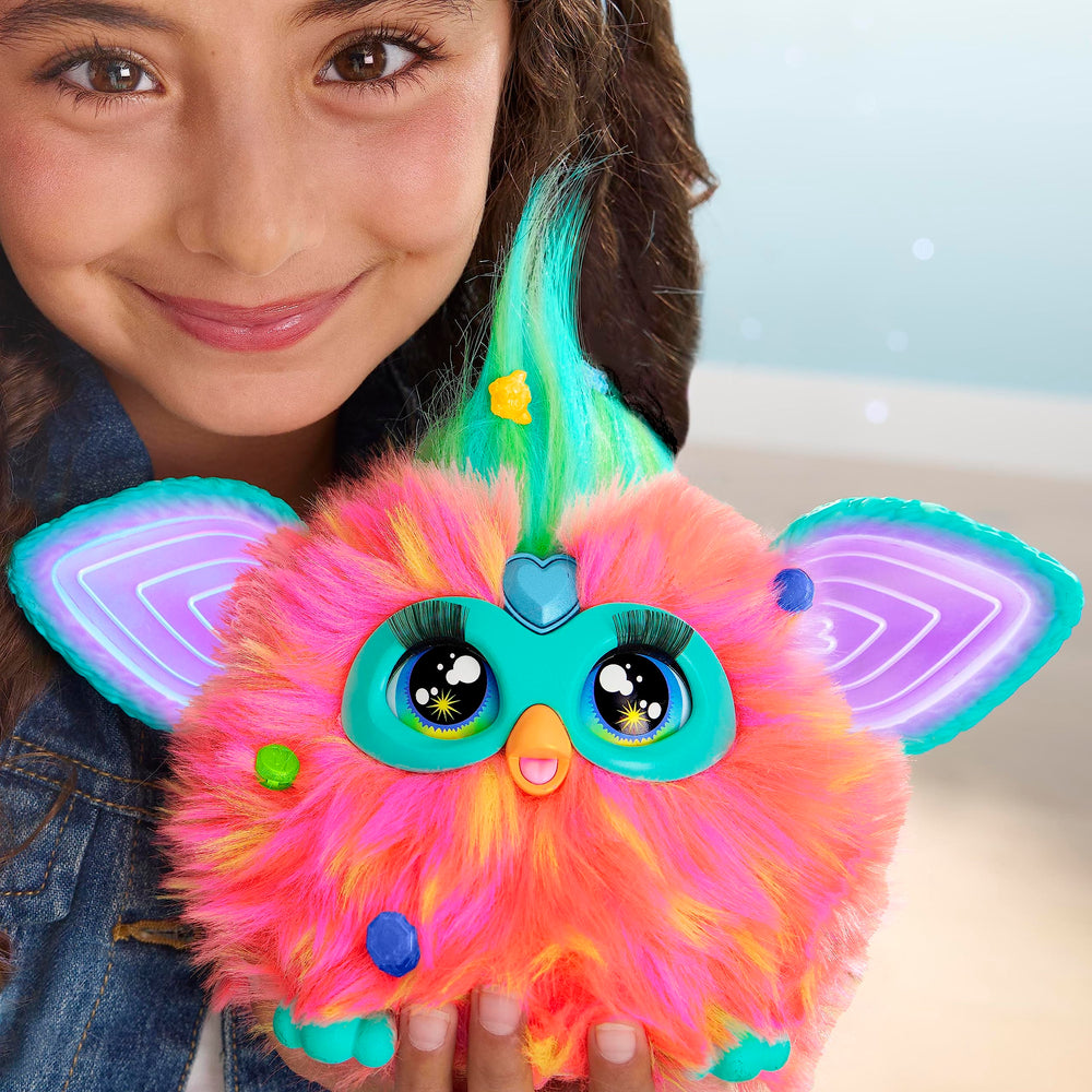 Two Furby Corals interact for shared storytelling experiences.