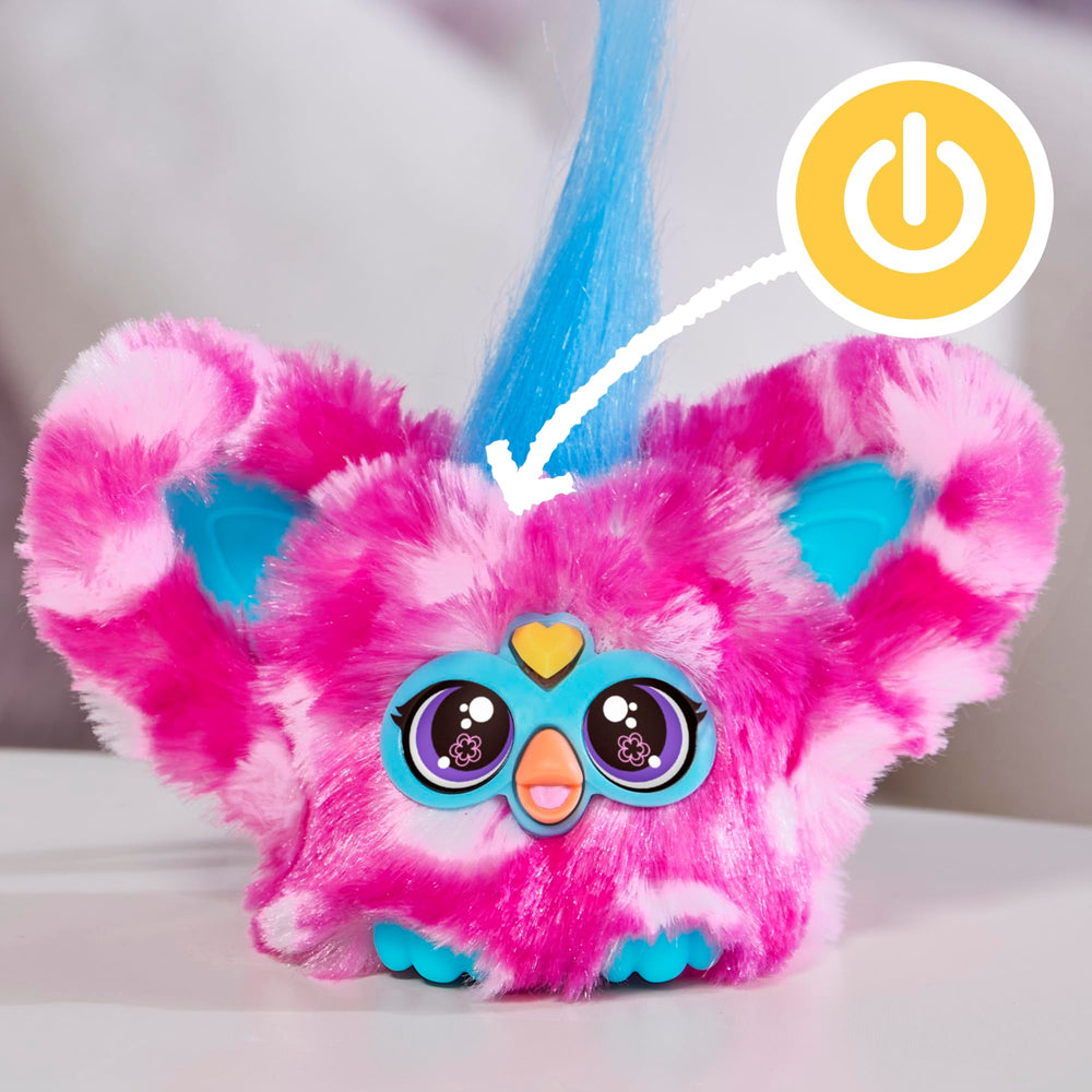 Furby Dah-Tee's peekaboo ears reveal the character for added delight.