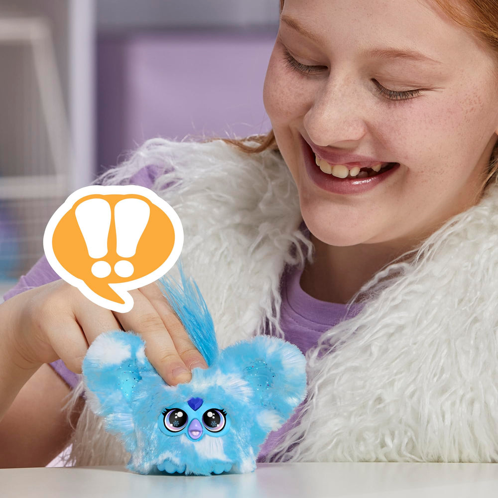 Furby Furblets Sno-Way peekaboo ears pop open for interactive surprise.