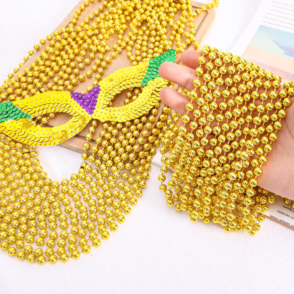 Garma Mardi Gras beads 33-inch necklaces in bright gold for standout outfits.