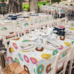 Gatherfun donut tablecloth donut-theme setup inspires playful party ambience.