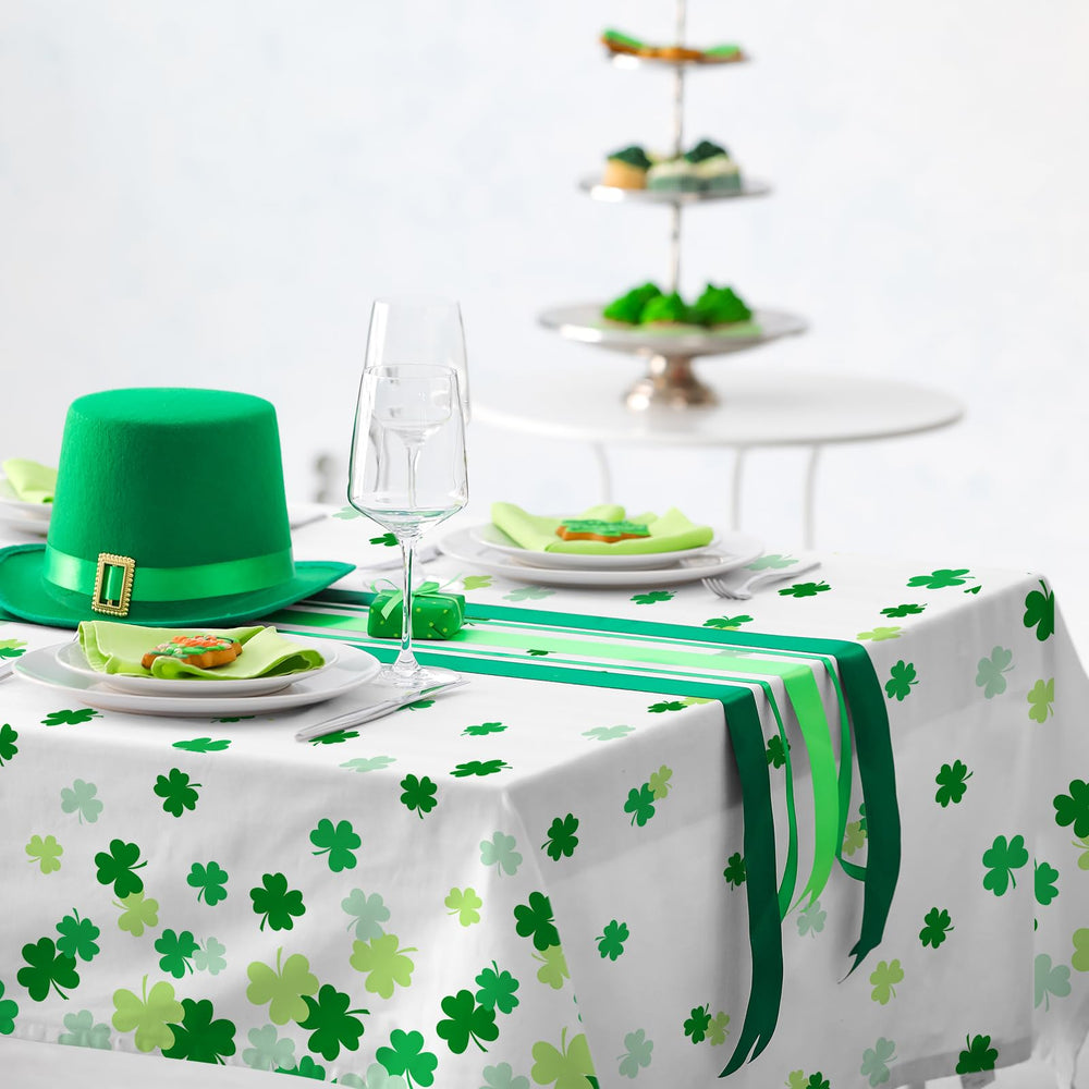 Gatherfun Leprechaun-approved table cover features vibrant shamrocks across white background
