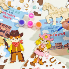 GEECOZYLIFE mini watercolor paints add vibrant color to wooden figures.