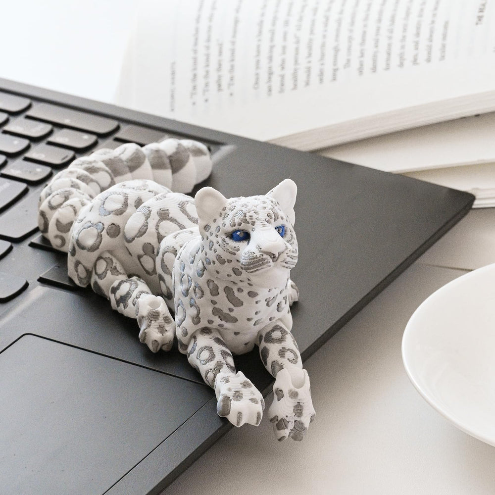GemmiCho handcrafted office snow leopard serves as a tasteful collector's piece.