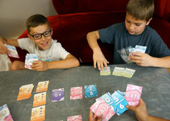 Genius Games Math Rush family night card 7 makes learning engaging at home.