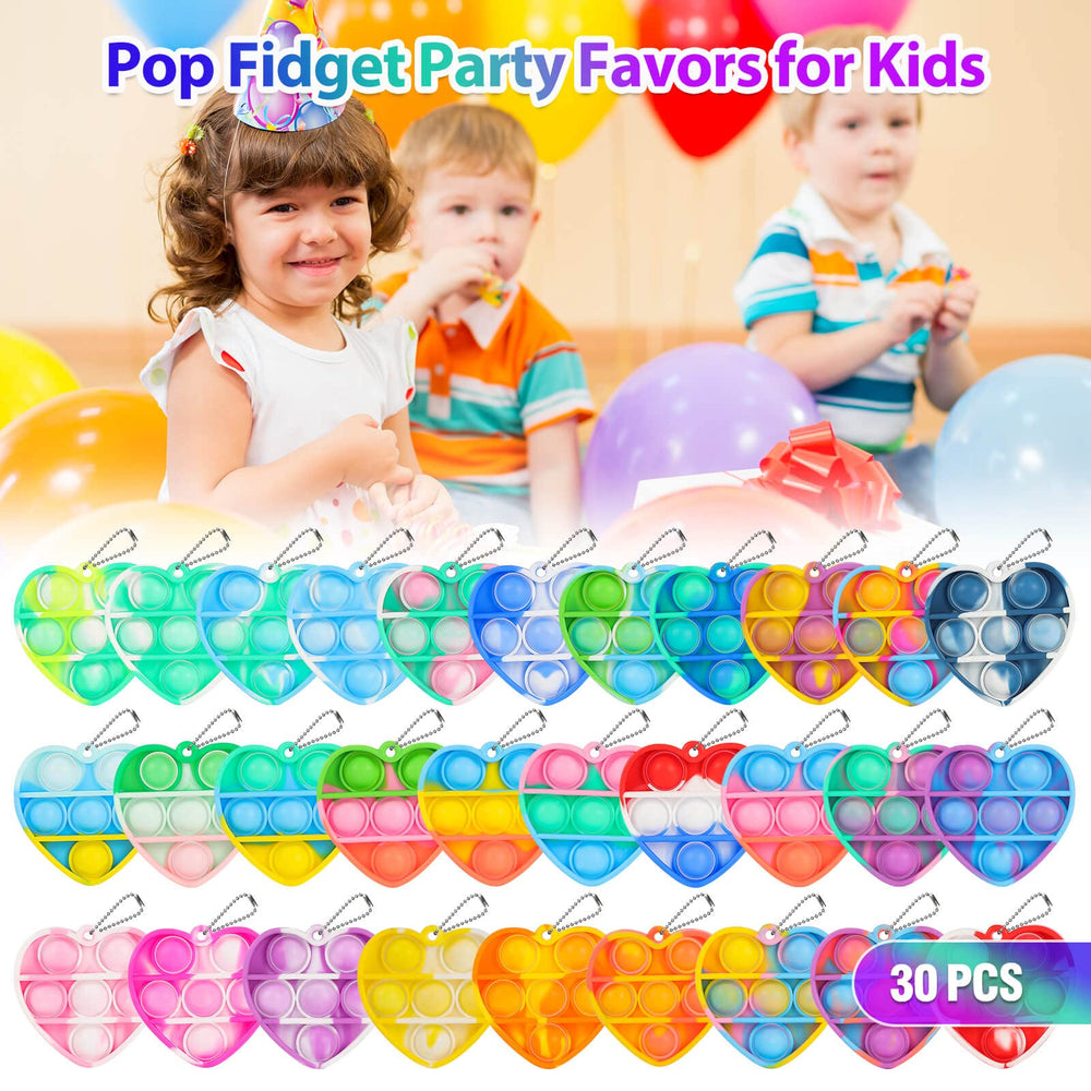 Genuvi pop heart keychain silicone safety tested for kid-safe play.