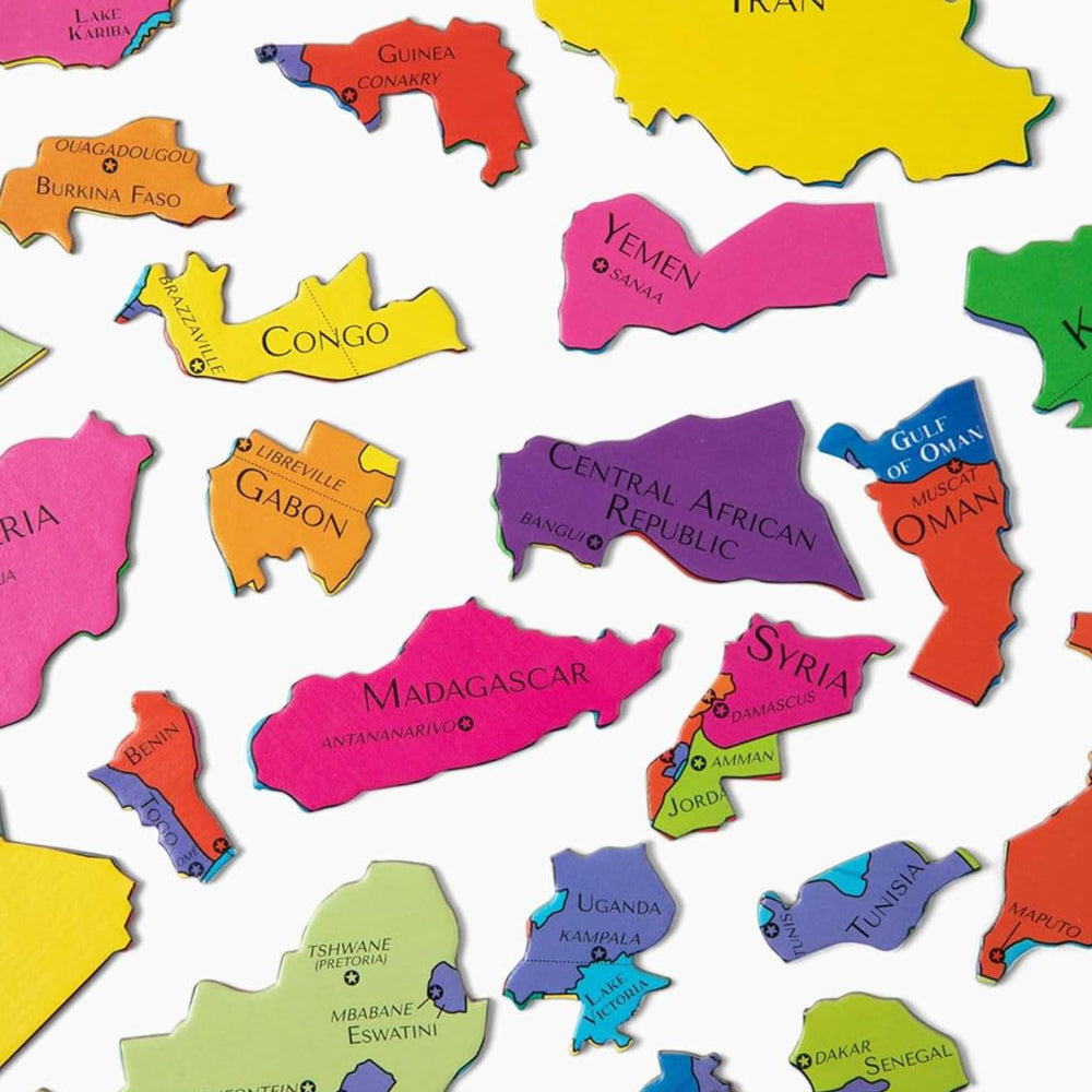 Geotoys GeoPuzzle Africa Middle East family playing together to build teamwork.
