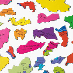 Geotoys GeoPuzzle Africa Middle East family playing together to build teamwork.