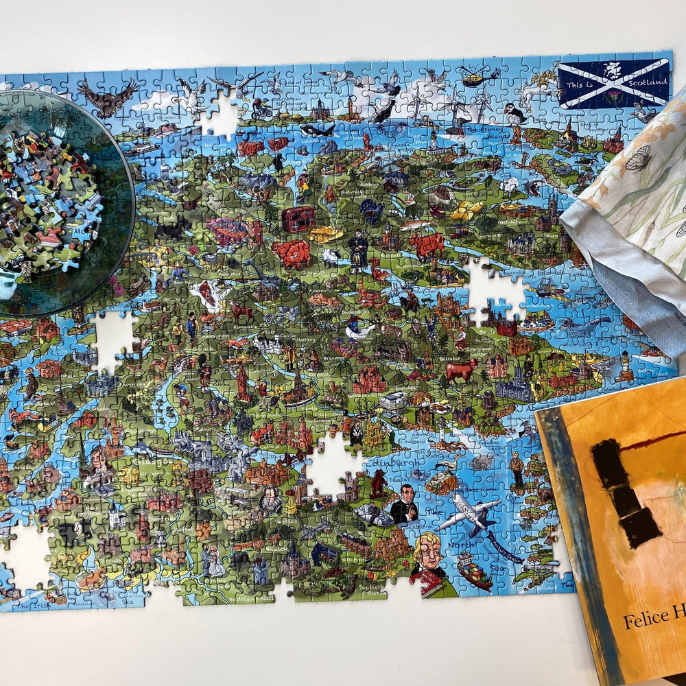 Gibsons This is Scotland puzzle includes a poster to reference while you piece.