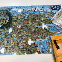 Gibsons This is Scotland puzzle includes a poster to reference while you piece.