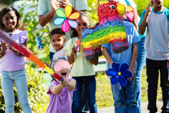 GiftExpress Rainbow Donkey Piñata side view showing colorful tissue for Cinco de Mayo