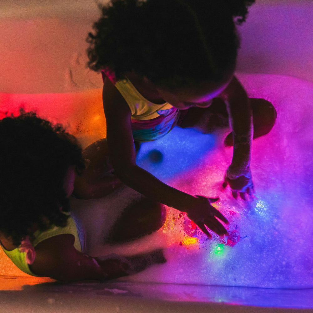 Glo Pals three-color light-up cubes support visual tracking and color sorting.