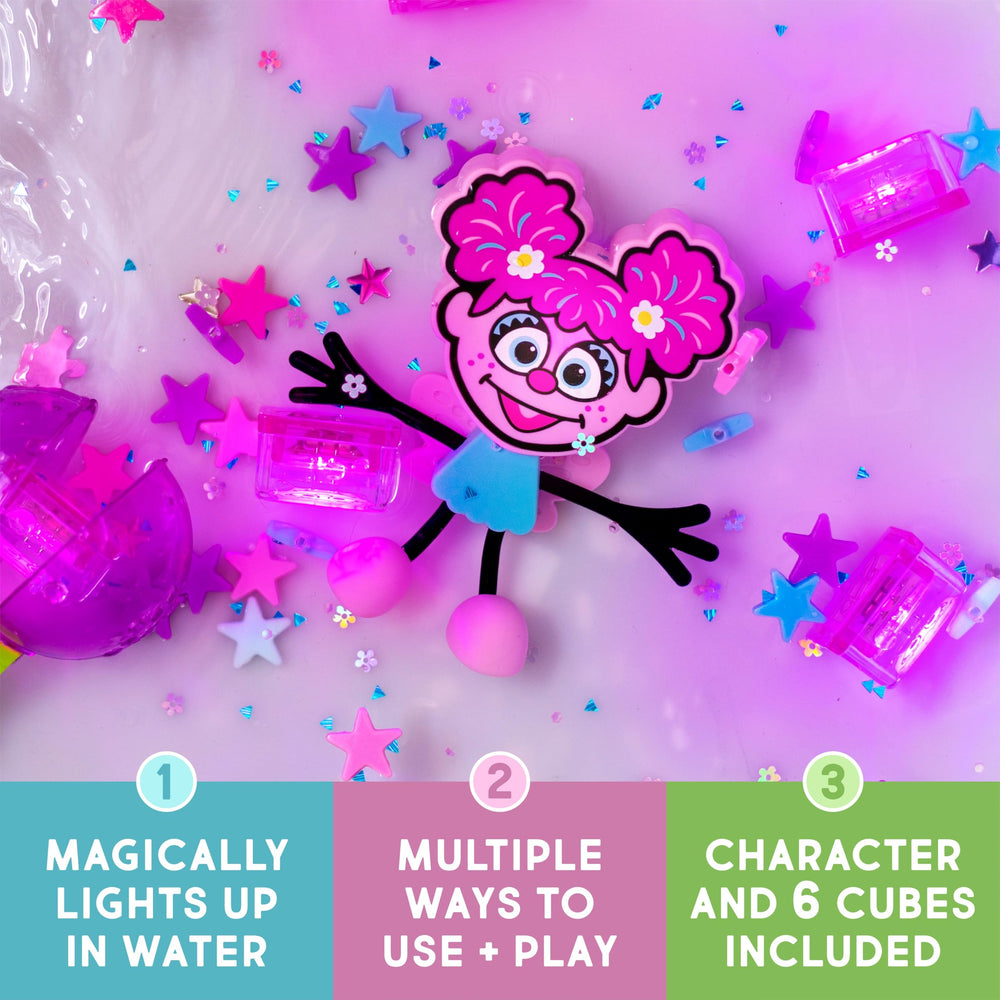 Glo Pals Sesame Street orange lit cubes support color recognition and motor skills during bath time.