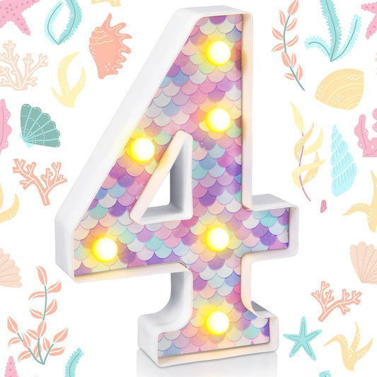Glooglitter Mermaid LED number 4 on a table creates a warm, eye-catching centerpiece glow.