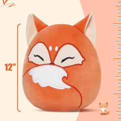 Glow Guards red fox plush on sofa as cute decor.
