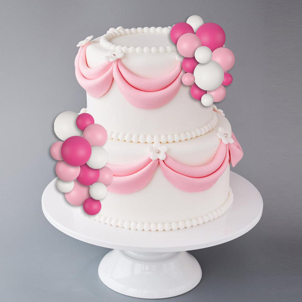 Goensjt white 2cm ball topper offers simple dessert accents