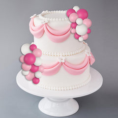 Goensjt white 2cm ball topper offers simple dessert accents