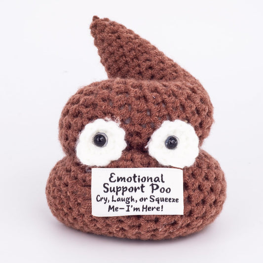 GOODLYSPORTS Positive Poo plush on desk for light-hearted stress relief and humor.