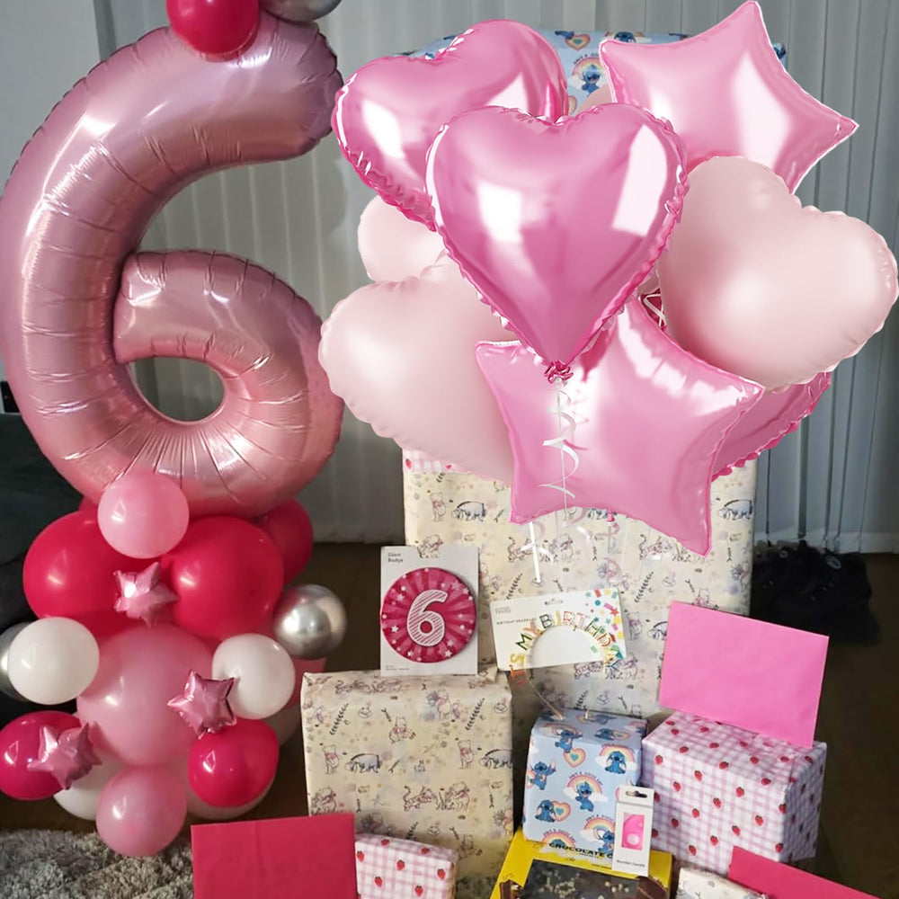 Govpy soft pink star balloon adds whimsy to any event.