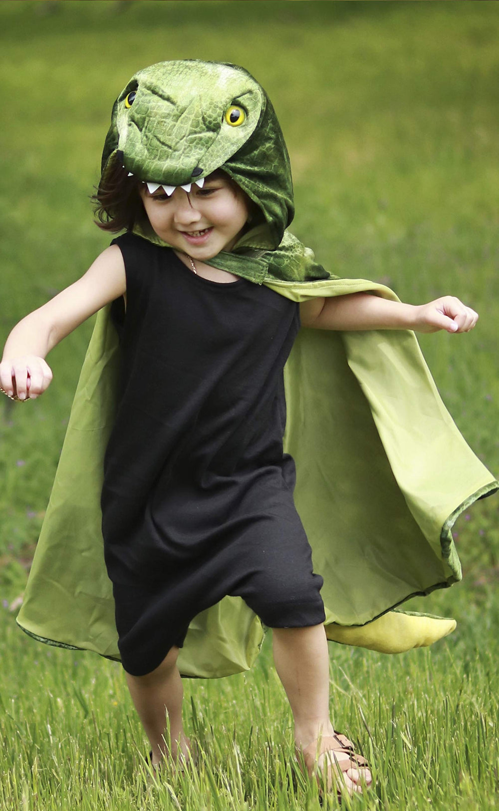 Great Pretenders T-Rex Hooded Cape worn by child shows easy care and washability.