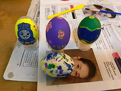 Green FABWOOD eggs with a surface ready for patterns and doodles.
