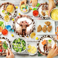 Grencian Highland Cow party table setup inspires festive styling.