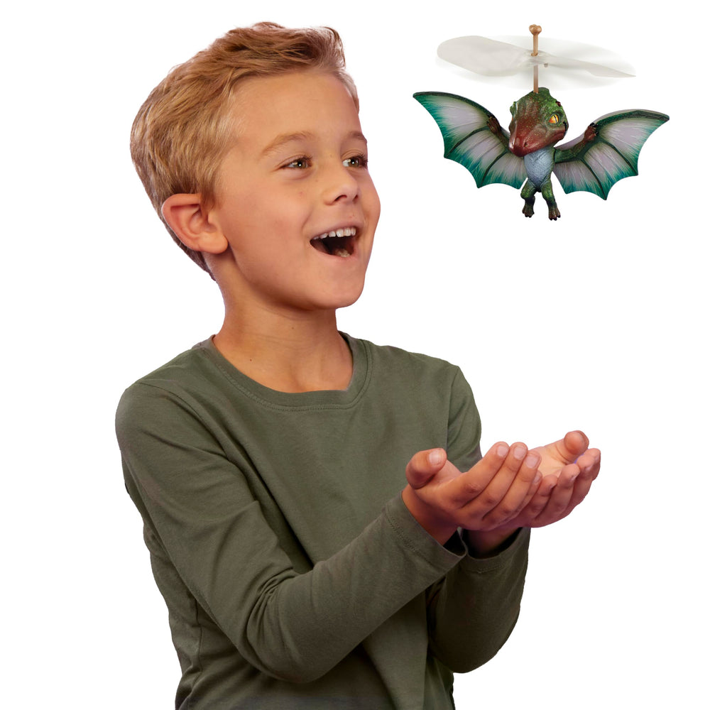 GrossMos Flying Dino green small dino escapes during pretend flight.