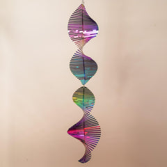 GRPWWT wind spinner reflects surrounding light, enhancing garden decor