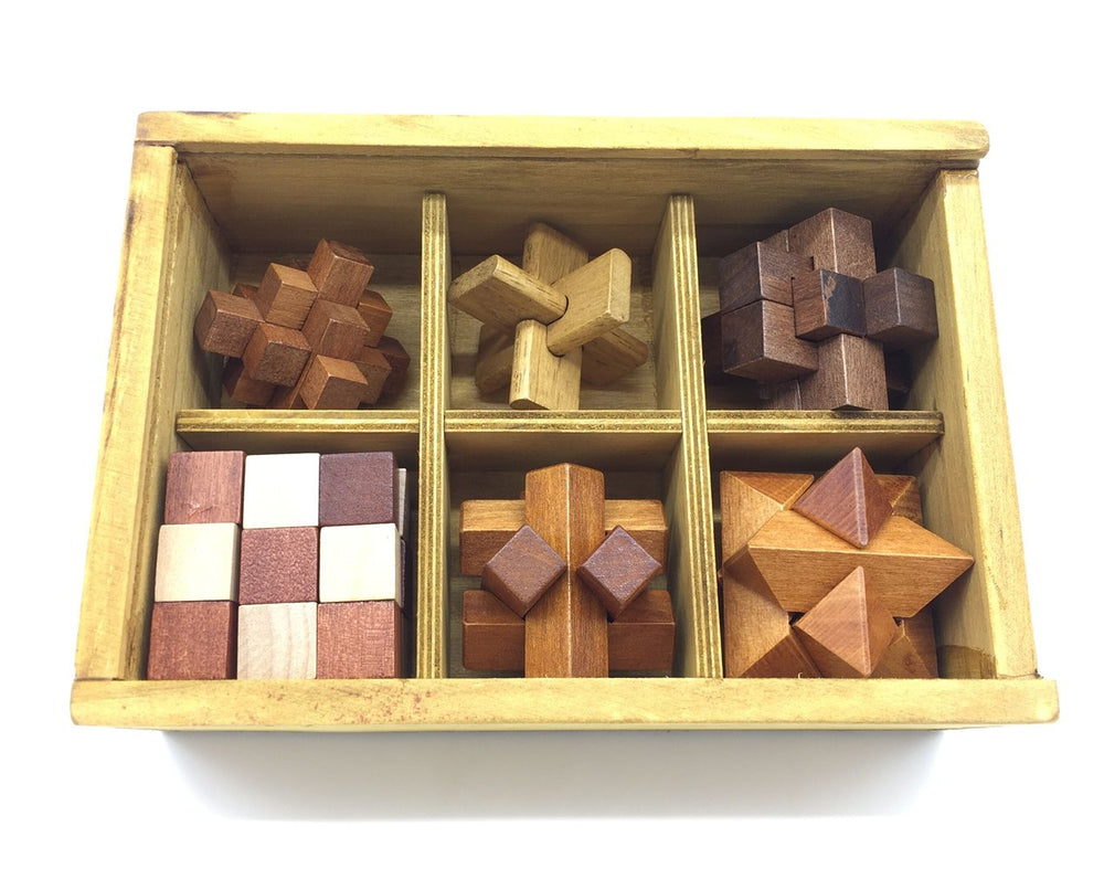 Guaishou handmade wooden puzzle showing natural grain and craft.