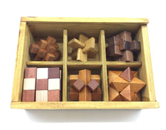 Guaishou handmade wooden puzzle showing natural grain and craft.