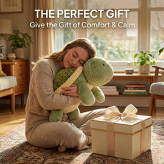Gudisi weighted turtle plush placed on a bed, perfect for nap time and relaxation.