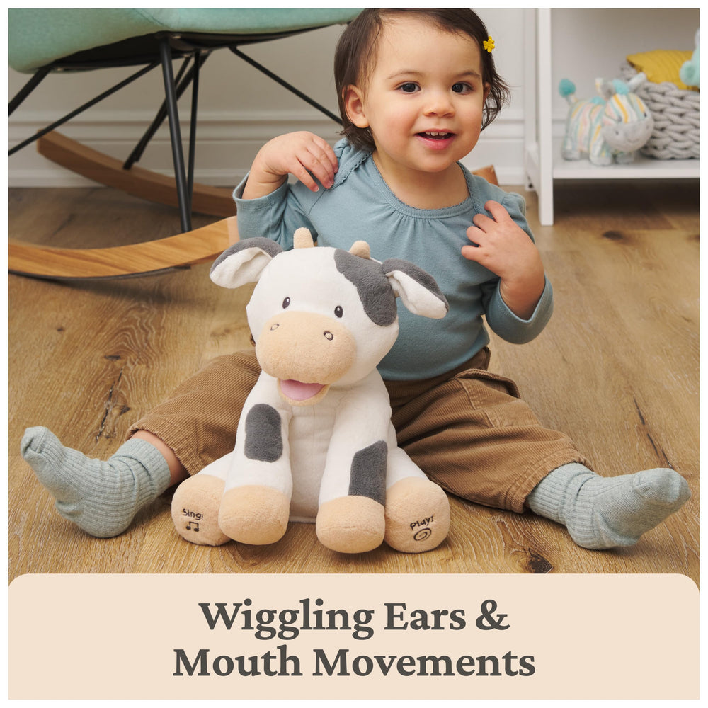 GUND Buttermilk cow ears wiggle during play, inviting sensory exploration for babies