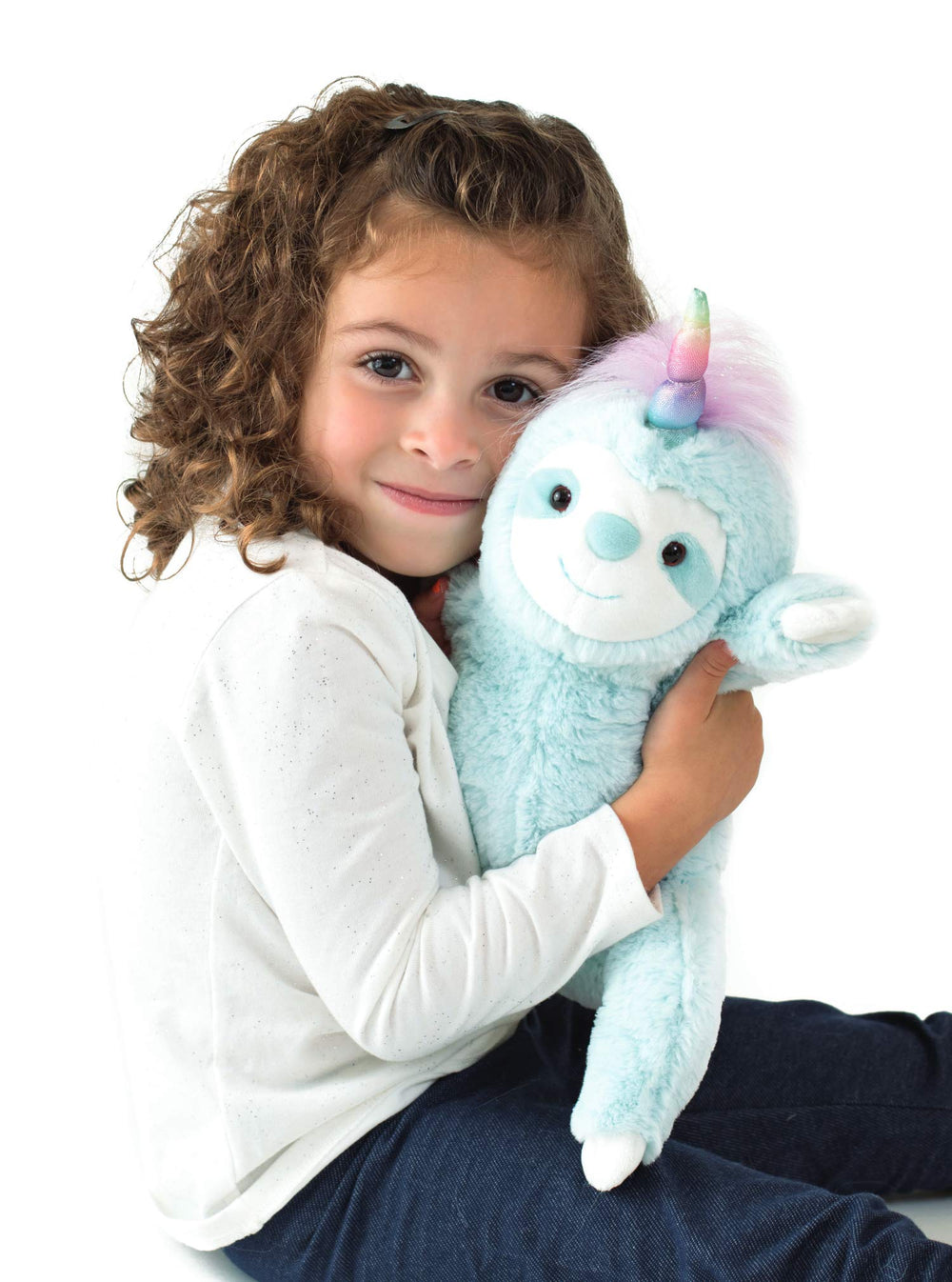 Dazzle Slothicorn's sparkling rainbow horn and fluffy mane invite imaginative play.