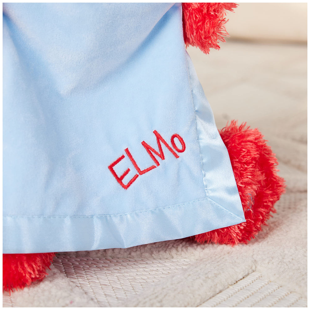 GUND Elmo plush stands at about fifteen inches for toddlers' easy handling.