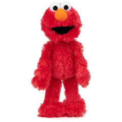 GUND Elmo 13-inch plush eyes detail, friendly expression for imaginative play.