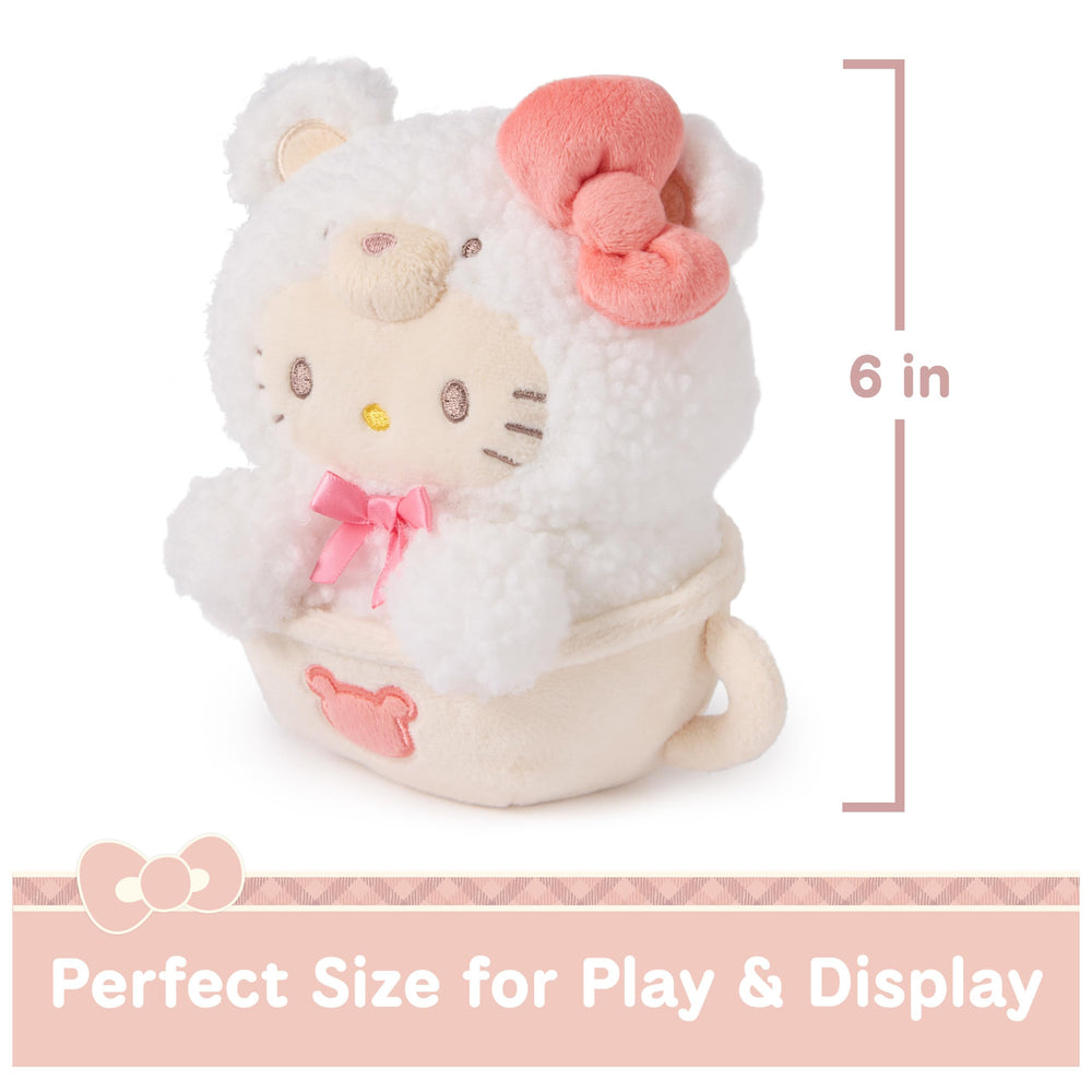 Soft white plush with brown embroidery enhances the collectible look.
