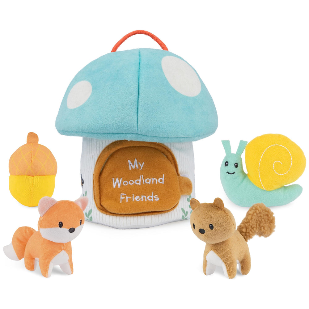 GUND My Woodland Friends mushroom house stores four soft sensory toys for on-the-go play.
